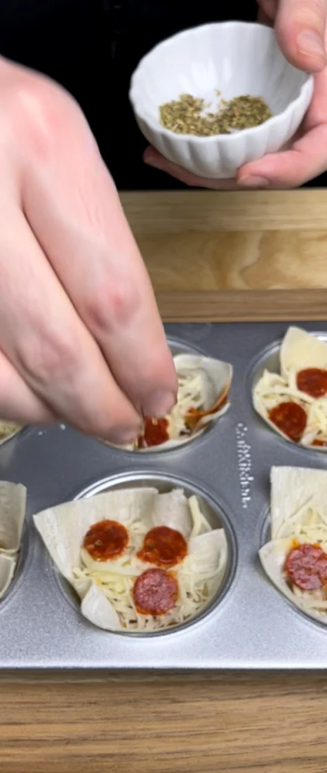 Image of A little cheese and tiny pepperoni along with oregano (optional but delicious)