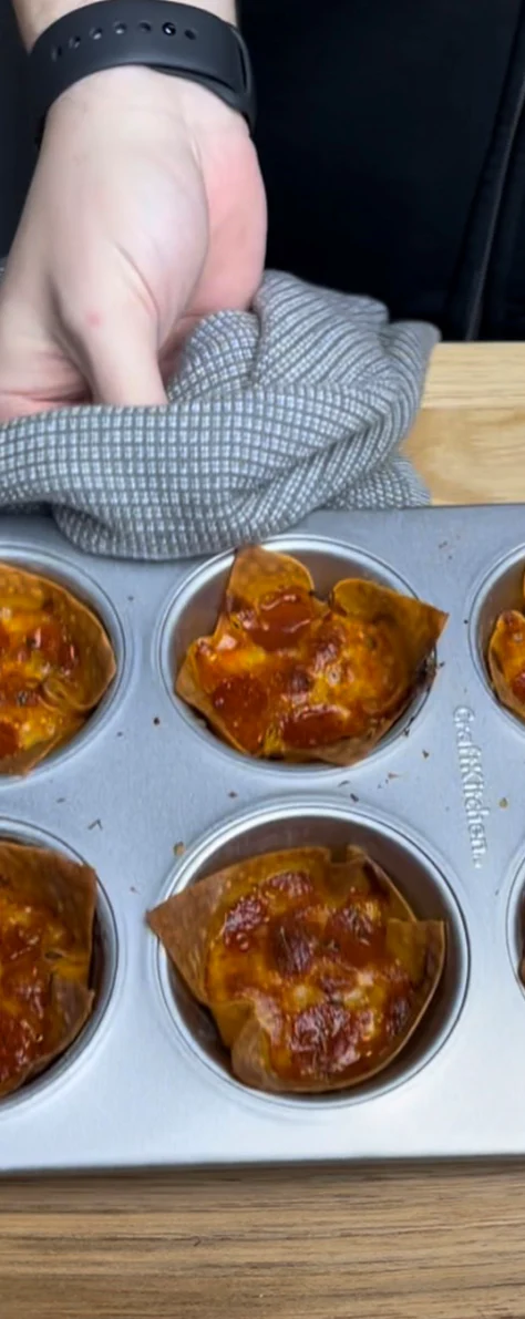 Image of Place muffin tin into the oven at 380 degrees for 13 minutes.