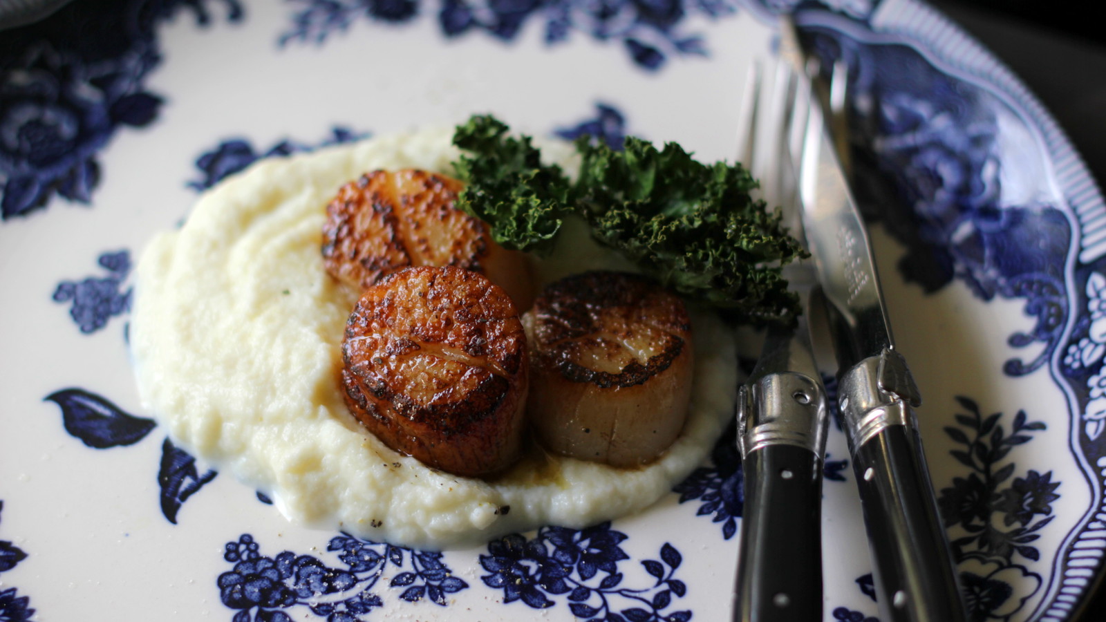 Image of Seared Scallops with Black Truffle Salt, Cauliflower Purée & Kale Crisps