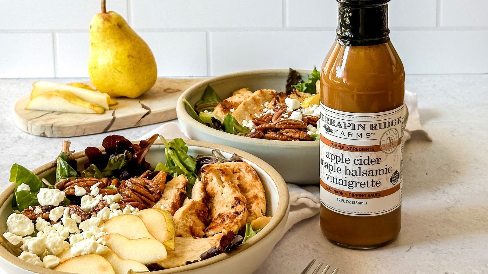 Image of Grilled Chicken and Pear Salad with Apple Cider Maple Balsamic Vinaigrette