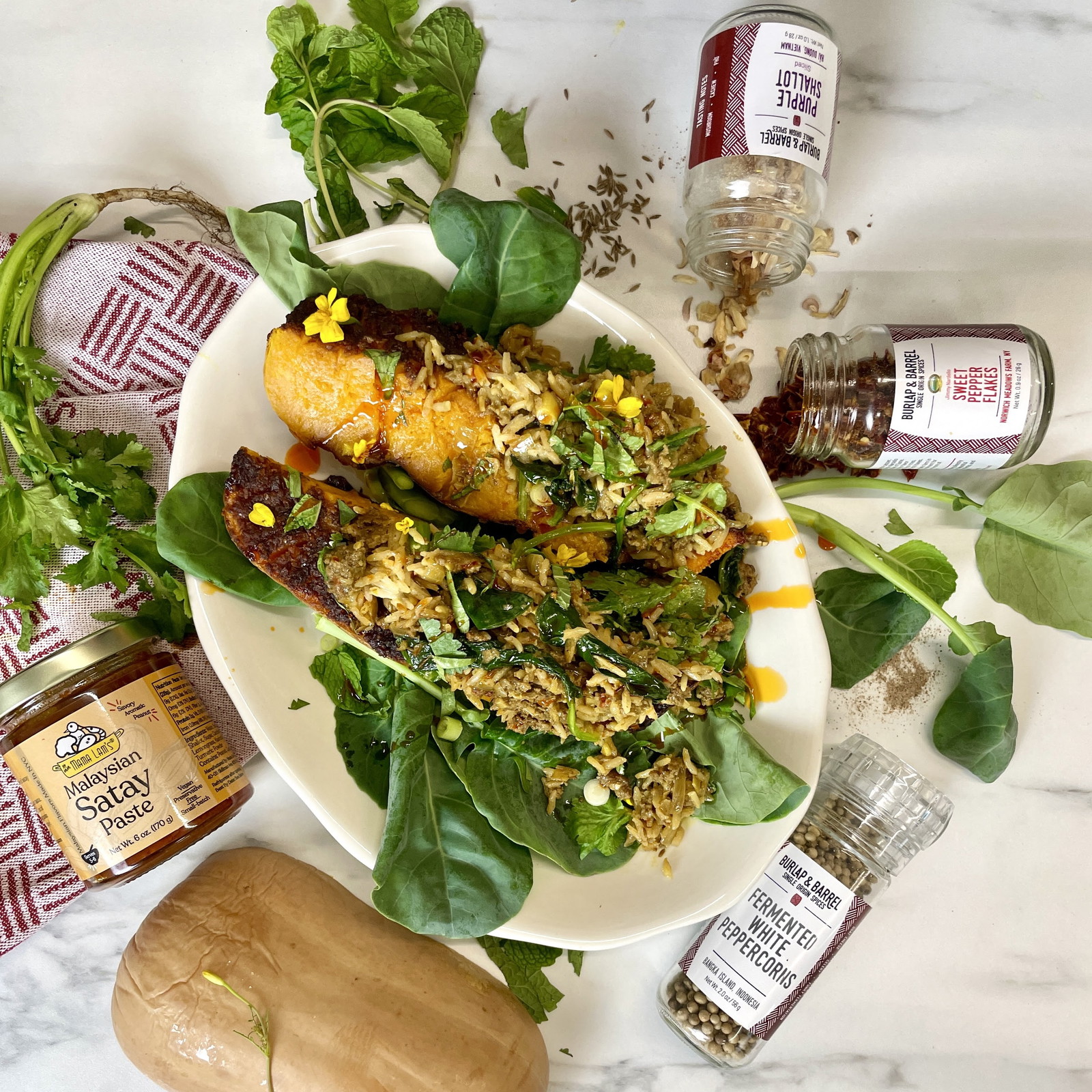 Image of Bubur Lambuk-Stuffed Butternut Squash With Mama Lam’s Satay Glaze