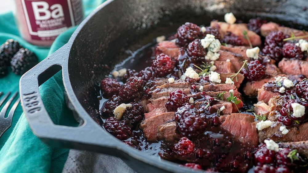 Image of NY Strip Steak with Boozy Balsamic Blackberries