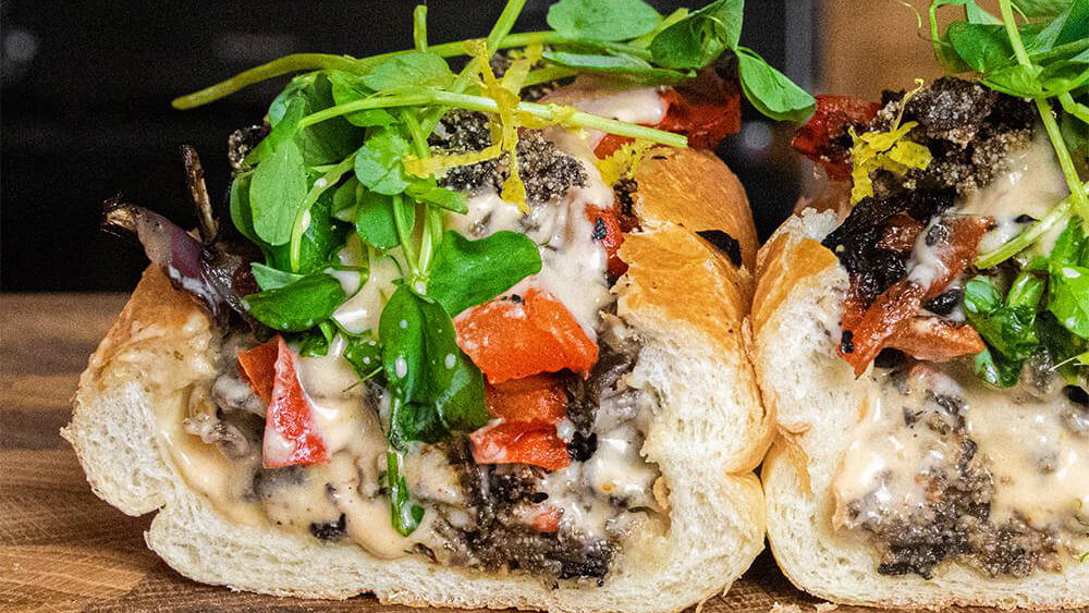 Image of Mushroom Philly with Black Magic Cheese Sauce