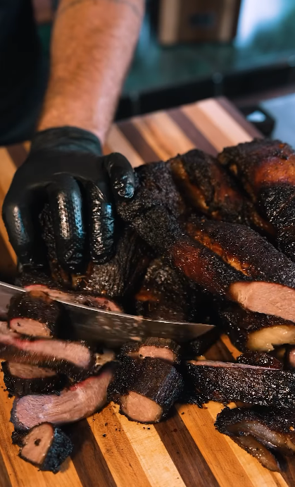 Image of Slice the braided brisket into portions and serve immediately.