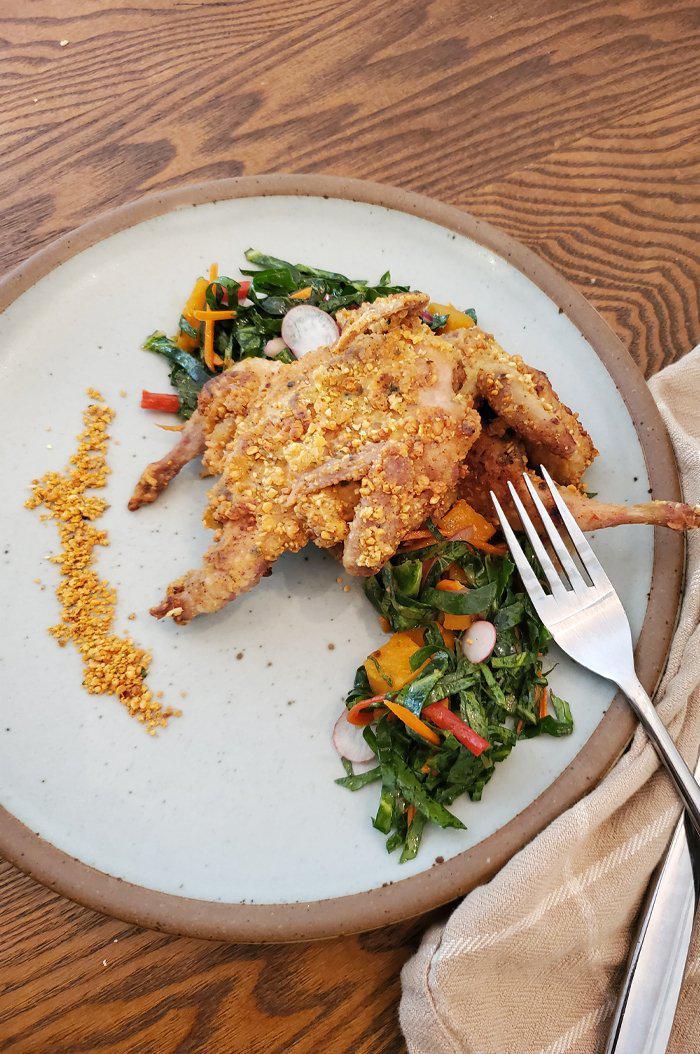 Spicy Peanut Crusted Quail with Collard Green Salad
