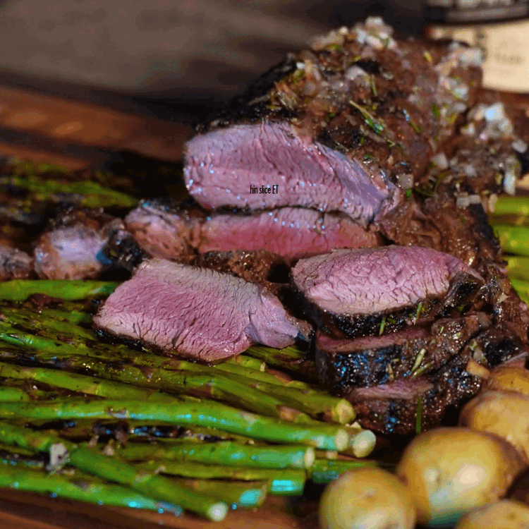 Image of Slice thinly and serve with the remaining tarragon whiskey butter drizzled on top.