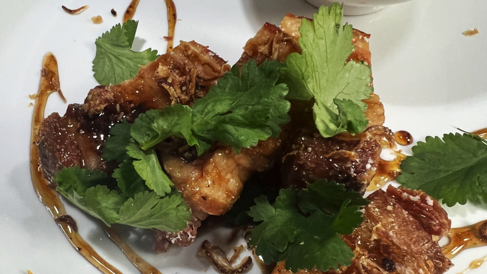 Image of Crispy Fried Pork Belly with Black Garlic Honey and Asian Style Slaw