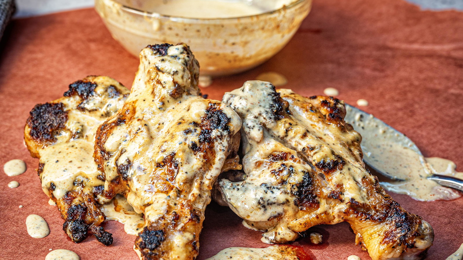 Image of Butterflied Chicken Legs with White Sauce