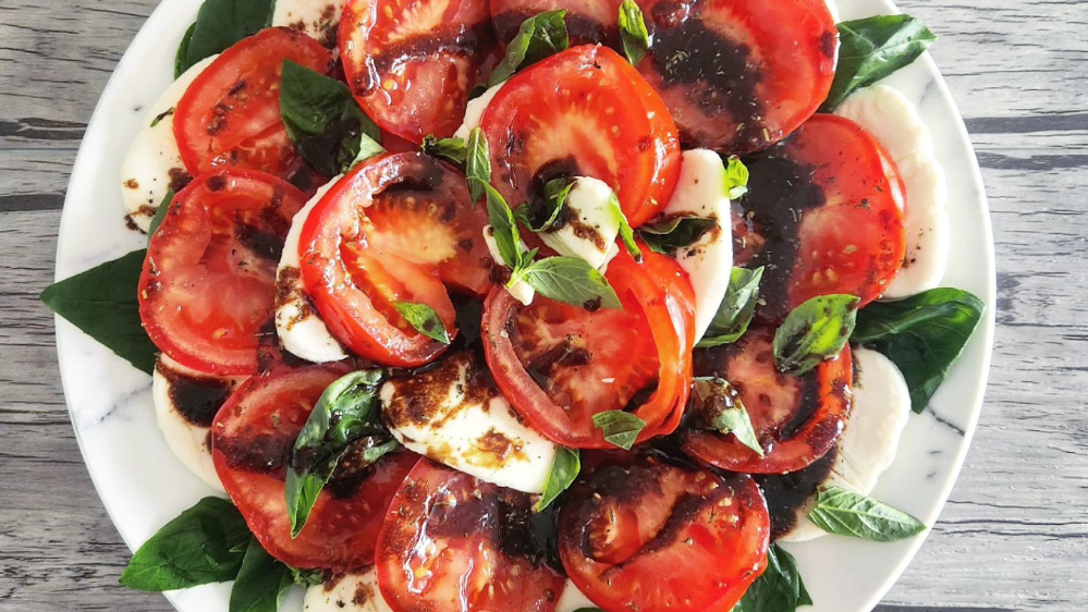 Image of TOMATO AND MOZZARELLA SALAD