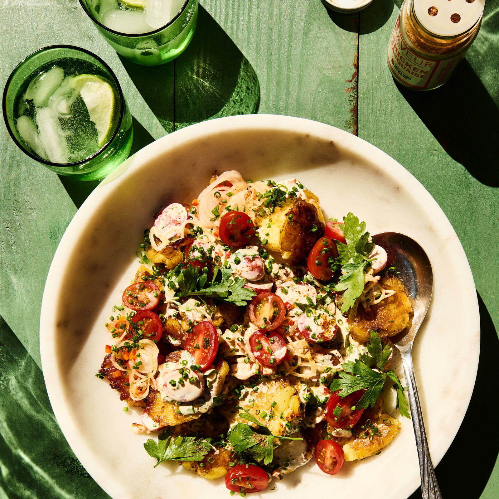 Image of Smashed Potato Salad with Cherry Tomatoes and Roasted Peppers