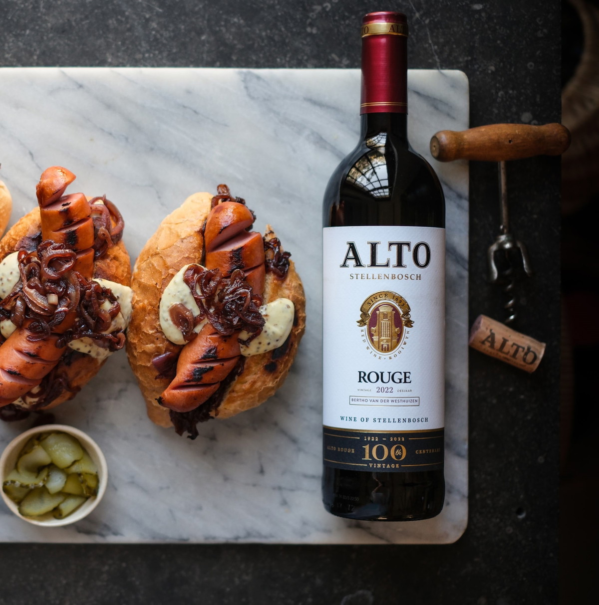 Bratwurst “Boerie” Rolls with Red Wine Onions