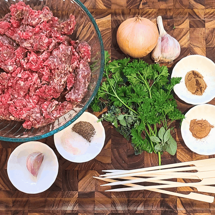Image of Place the ground bison in a large bowl, and gather all other ingredients. 