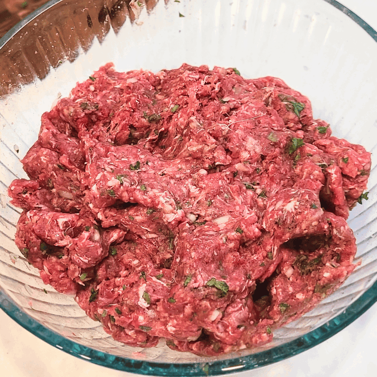 Image of Mix well using clean hands until all the ingredients are fully incorporated.