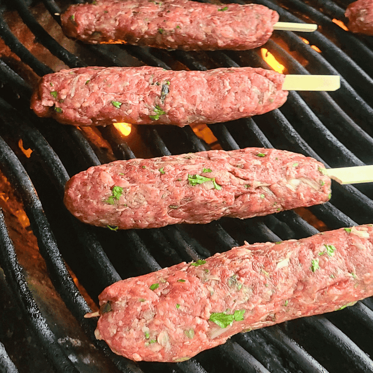 Image of Carefully place each skewer on the preheated and greased grill. Grill for about 6-8 minutes.
