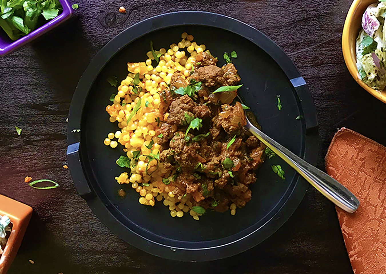 Image of North African Meat Sauce with Saffron Couscous