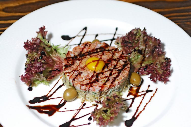 Image of Arrange a portion of tartare on each plate. For extra...