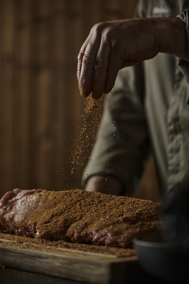 Image of Combine all spices in a small bowl. Remove the membrane from the ribs and apply seasoning to both sides.
