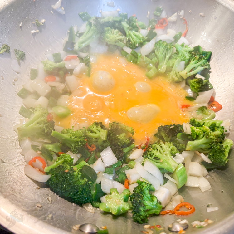 Image of Here I make a well in the middle of my veggies, pushing them to the side (you can also just remove them but I was being lazy) and add some more oil to the pan until it shimmers. Then add...