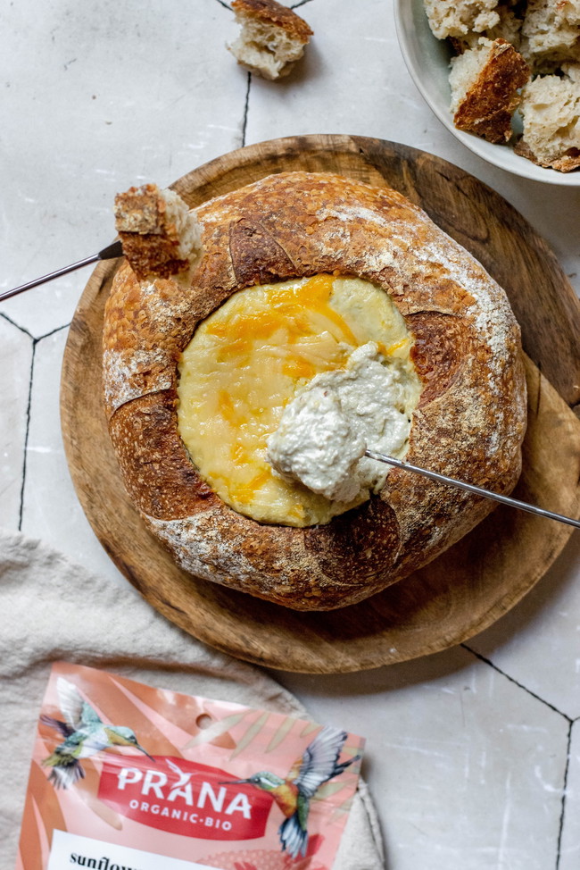 Image of Warm sunflower seed dip in a bread bowl