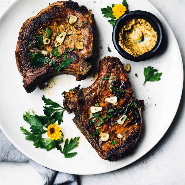 Image of Grilled Bone-In Pork Chops with Garlic Butter