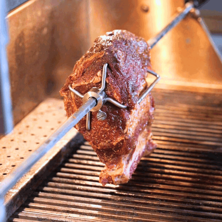 Image of Cook Roast: Mount the rib roast on the rotisserie or place on the grill over indirect heat. Use a thermometer to monitor internal temperature.