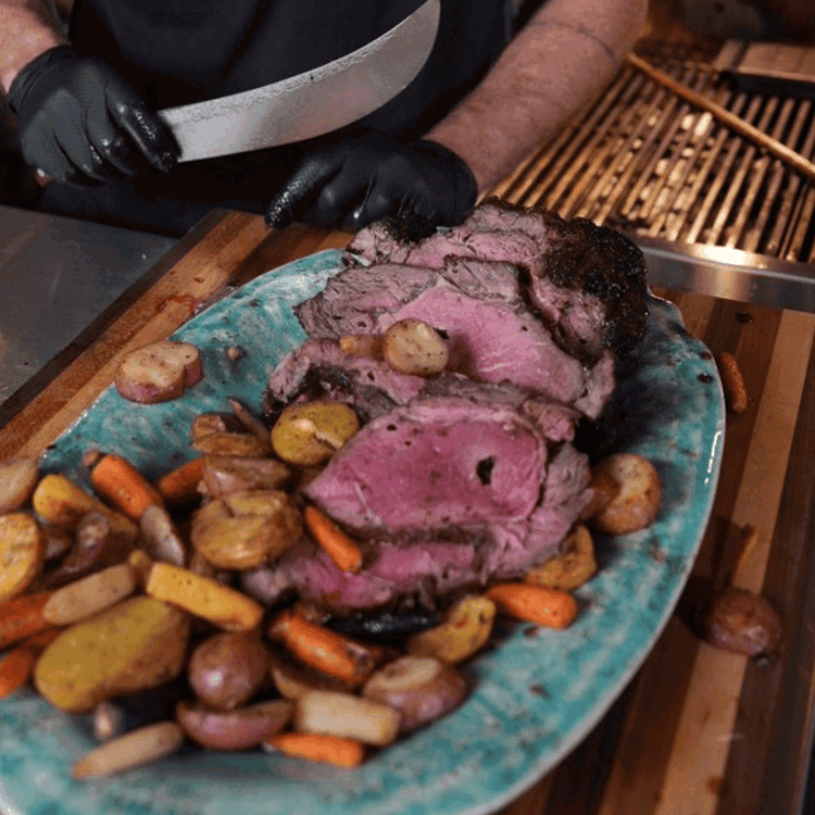 Image of Finish: Cook until internal temp reaches 125-130°F (medium-rare). Rest for 10 minutes before slicing and serving on a bed of the root vegetables. 