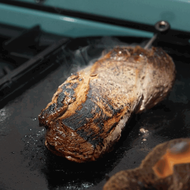 Image of Heat a cast iron skillet to med/high and sear the tenderloin on all sides. (2-3 mins per side).