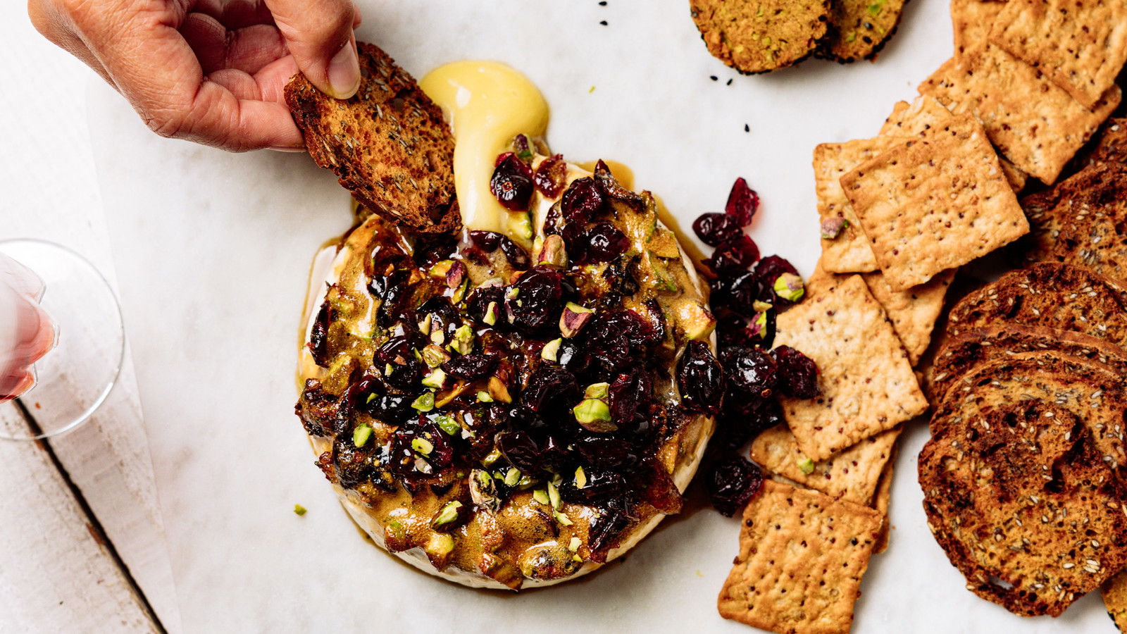 Image of Festive Baked Brie with Cranberries and Pistachio