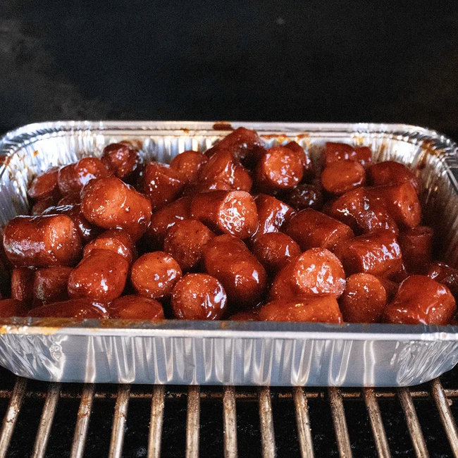 Hot dog burnt ends in aluminum pan