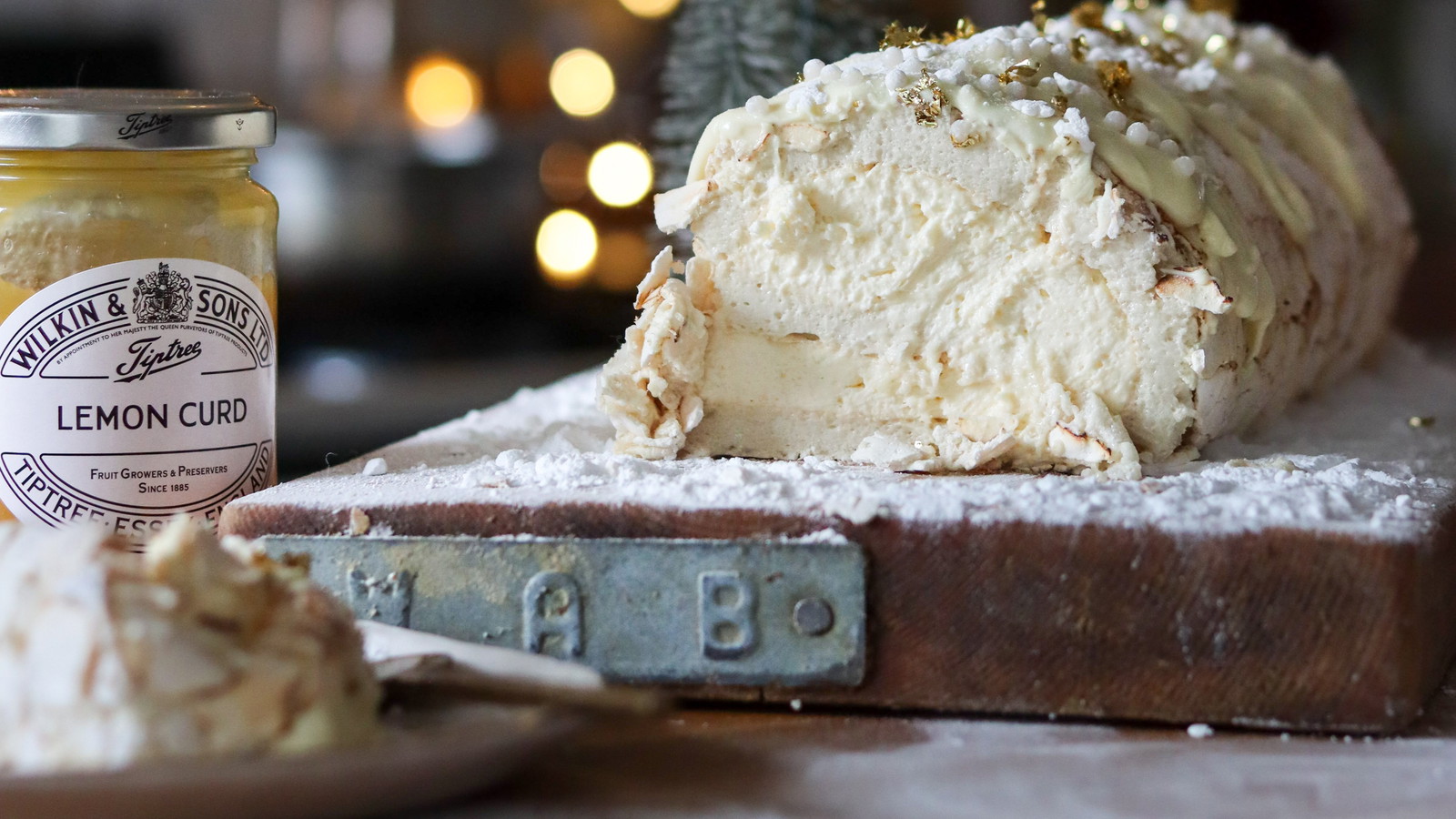 Image of Lemon Curd & White Chocolate Yule-ade Roulade by The Boho Baker