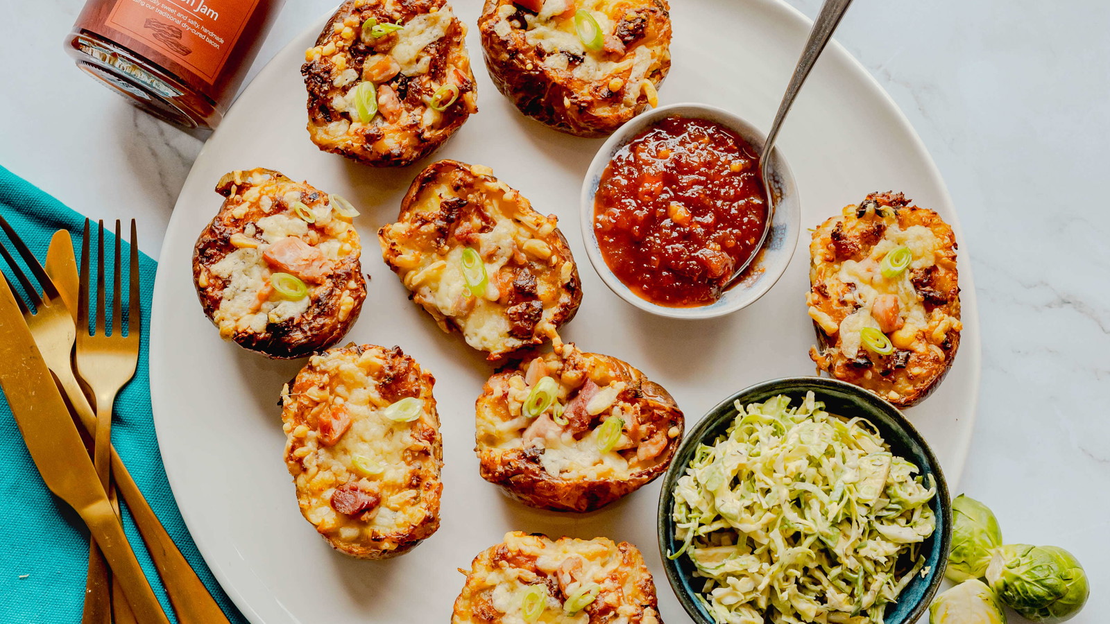 Image of Twice baked potatoes with ham and Brussels sprout slaw