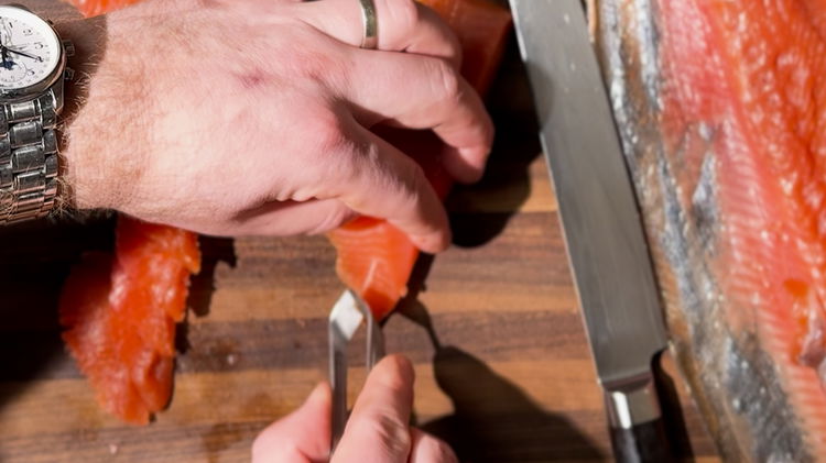 Image of Remove any pin bones using tweezers.