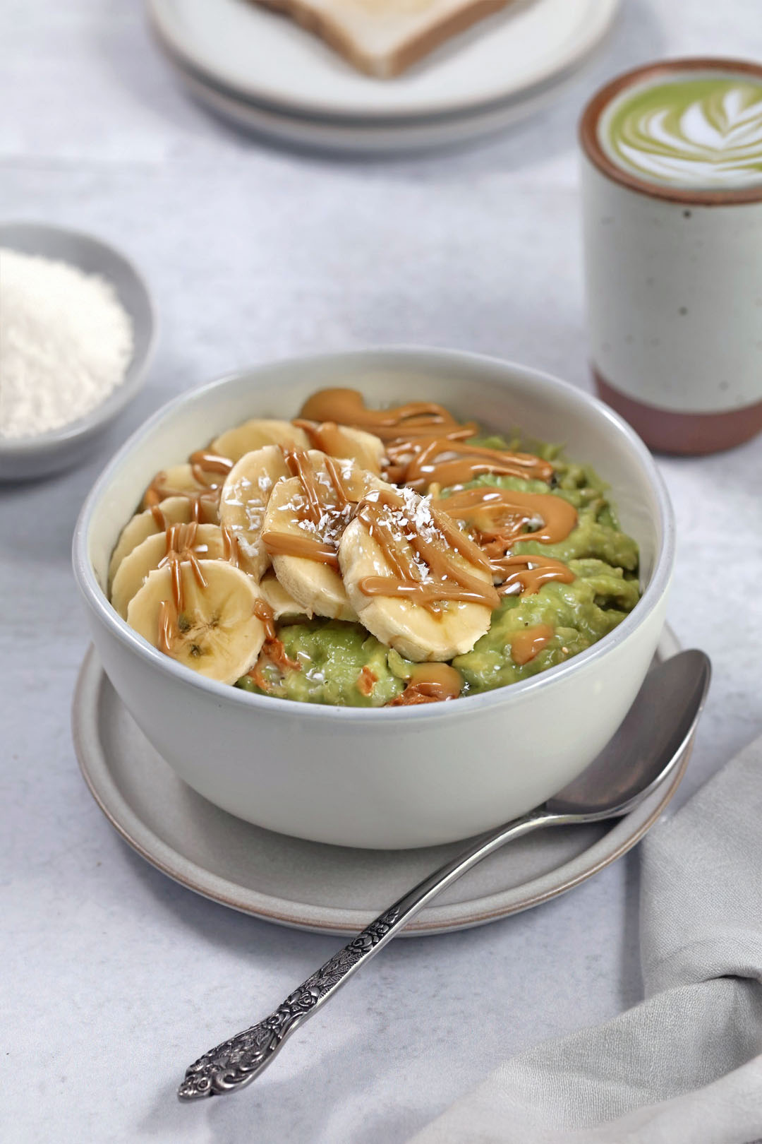 Image of Matcha Oatmeal with Almond Butter Drizzle: Comfort in a Bowl