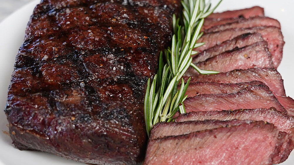 Image of Wagyu Denver Steaks on the Traeger Ranger