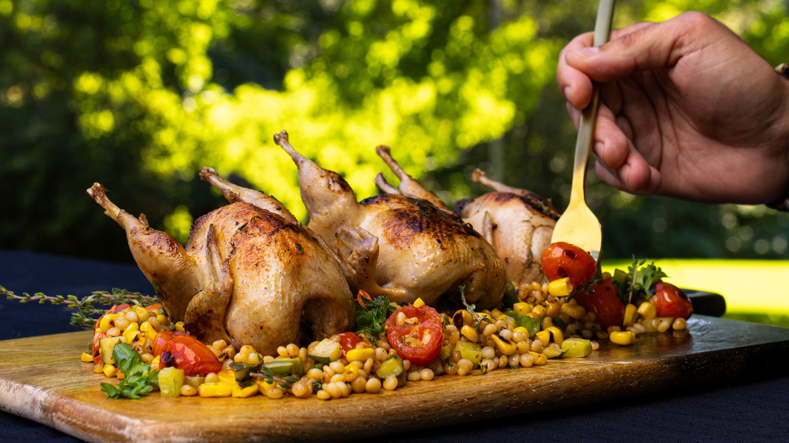 Image of Caille royale farcie à la camerise et au foie gras sur couscous aux légumes