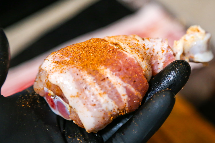 Image of Wrap the legs and season the outside again with the Ghost pepper BBQ Rub. Repeat this for as many chicken legs you have.
