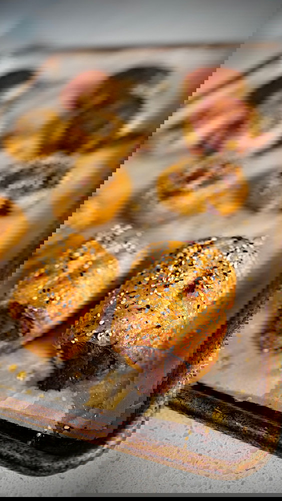 Image of Place onto baking tray with grease proof paper and bake for approximately 30 mins until pastry is golden brown and flakey 