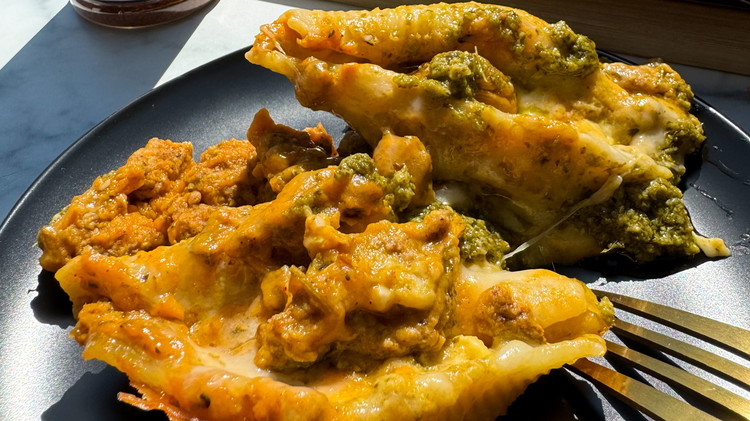 Image of Put half the sauce in the bottom of the casserole dish. Place the stuffed shells into sauce. Cover with the remaining sauce. Sprinkle the rest of the cheese mixture over the shells and transfer the casserole baking dish to the...