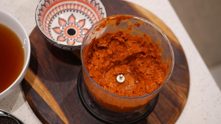 Image of Blend until the harissa paste is well combined.