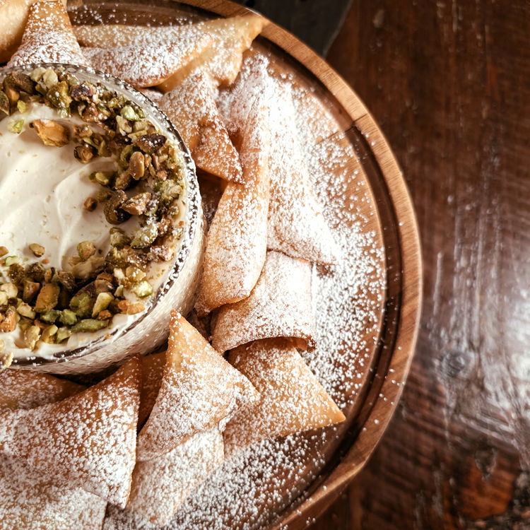 Image of Serve the dip garnished with chocolate chips or pistachios, accompanied...