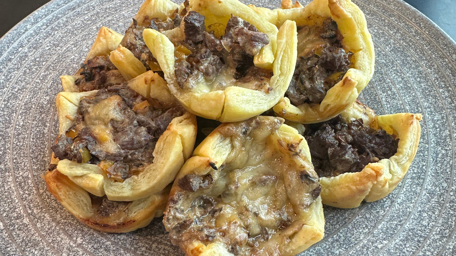 Image of Asada Philly Cheesesteak Bites