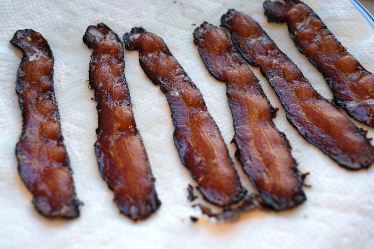 Image of Once done remove bacon onto a paper towel to cool and pad out the oil