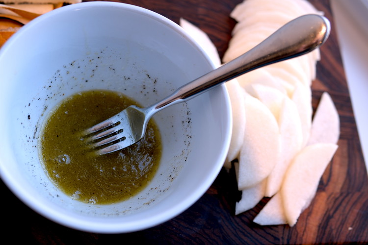 Image of  In a small bowl mix vinegar, mustard (helps emulsify), honey, salt, and black pepper.  Mix well until honey blends into.  Whisk in olive oil to emulsify