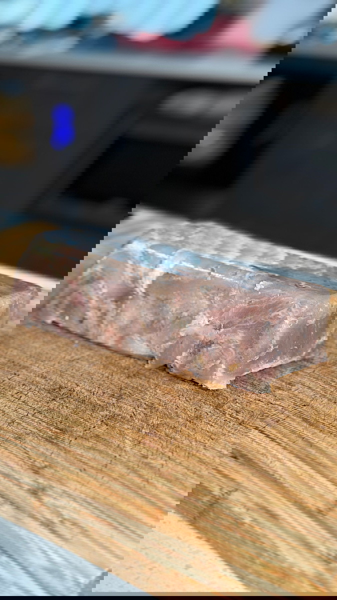 Image of Now remove the tendons from the mould and it should resemble braun or preformed deli meat. Slice into very thins strips approximately 2-3mm in thickness 