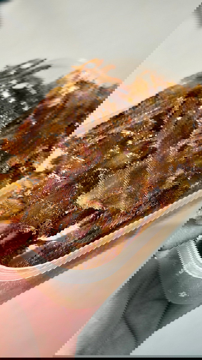 Image of Lightly oil wire racks and place the sliced tendons on it and place into your oven at 50-60C to dehydrate them. Or bang them into a dehydrator until hard and brittle. They should resemble the raw version of prawn crackers