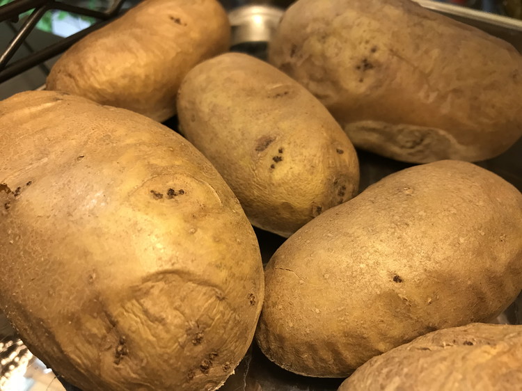Image of BAKE the potatoes in the morning so they are cooled down and ready for dinner. Lay potatoes on a baking dish (cleaned, poked with a fork, & uncovered) and bake at 375 until soft. Usually takes around an hour or...