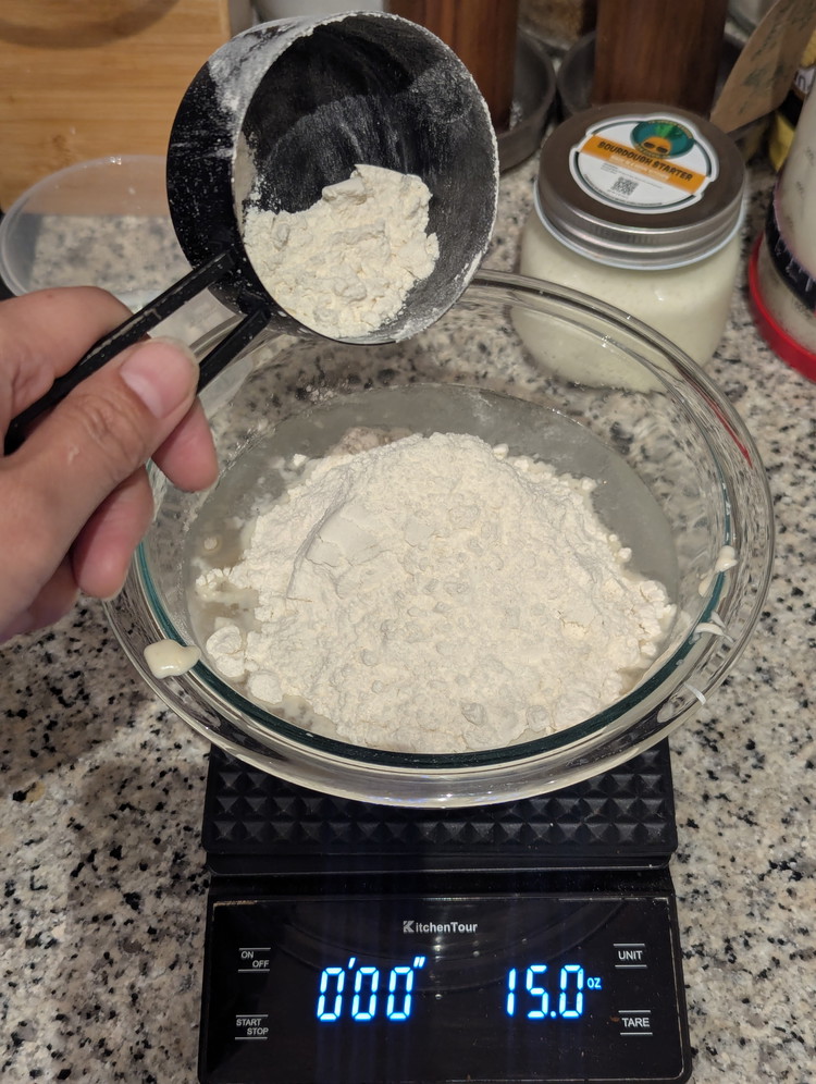 Image of Add 5 OUNCES of your quality flour of choice and mix well with a spatula. 