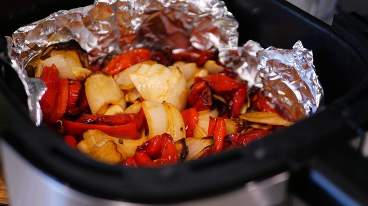 Image of Transfer the seasoned peppers and aromatic into an lined air...