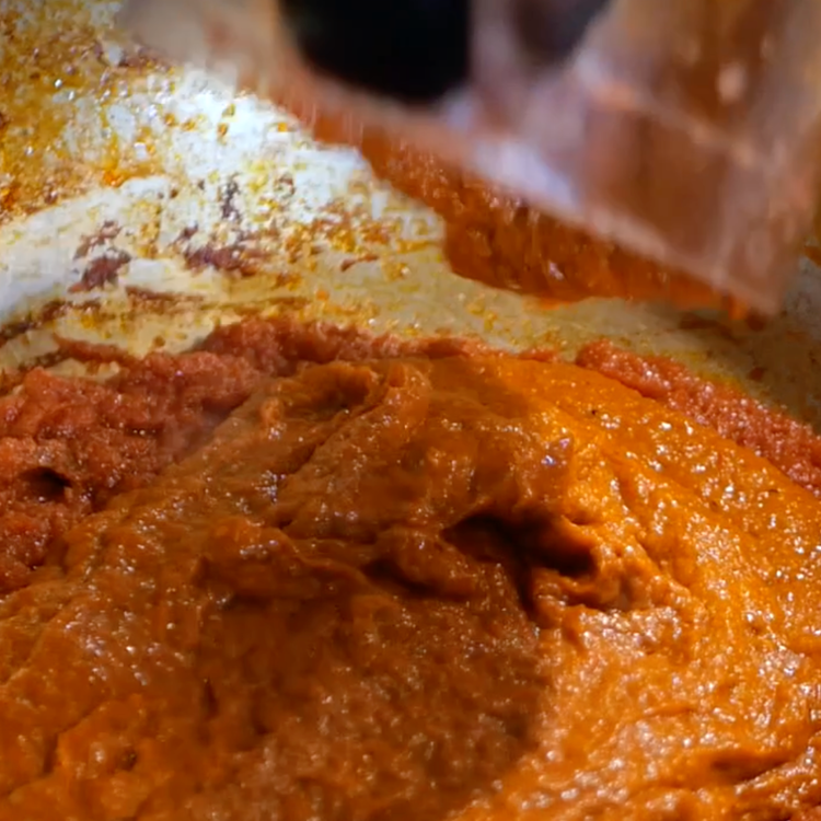 Image of Blend the pepper mix and pour it into the reduced...