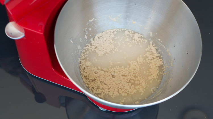 Image of In a mixing bowl combine yeast, sugar with lukewarm water....